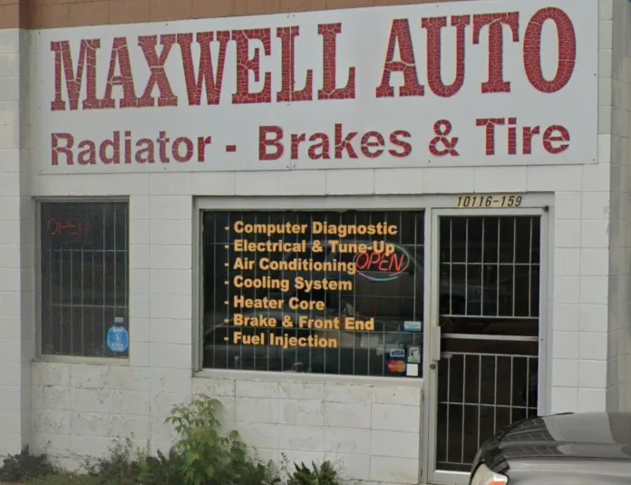 Front of Maxwell Auto Service on 159 Street, with the red MAXWELL AUTO wall sign and services listed in the window