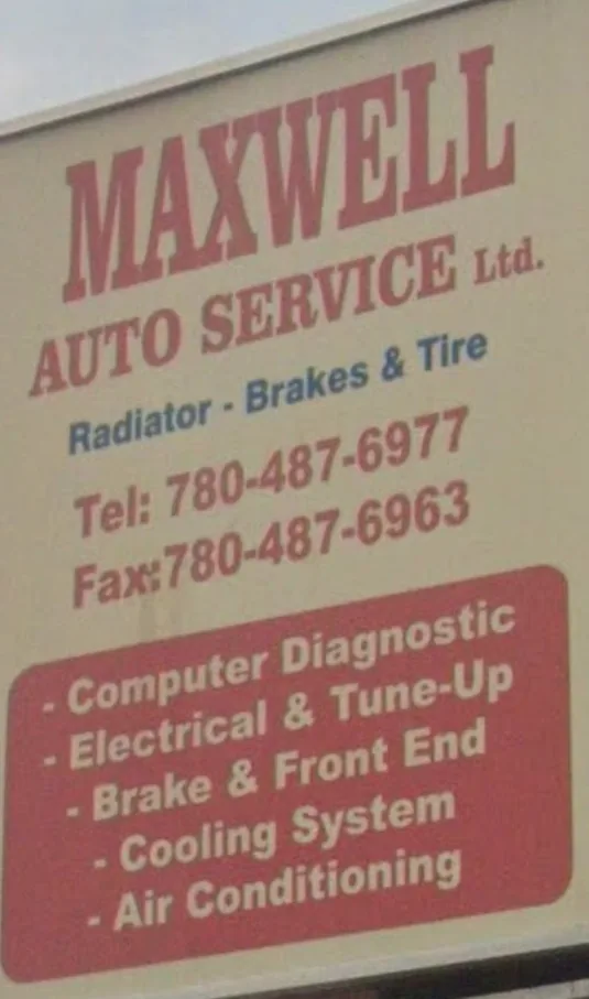 Maxwell Auto Service Ltd. corner sign listing radiator, brakes and tire, computer diagnostic, electrical and tune-up, brake and front end, cooling system and air conditioning